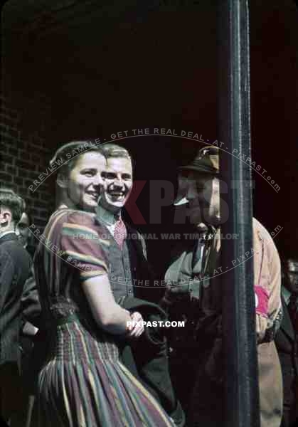 1939 Freiburg city NSDAP brown shirt soldier with red party armband talk to american tourists