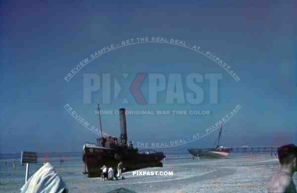 agrounded ship at the beach of Trouville-sur-Mer, France 1940