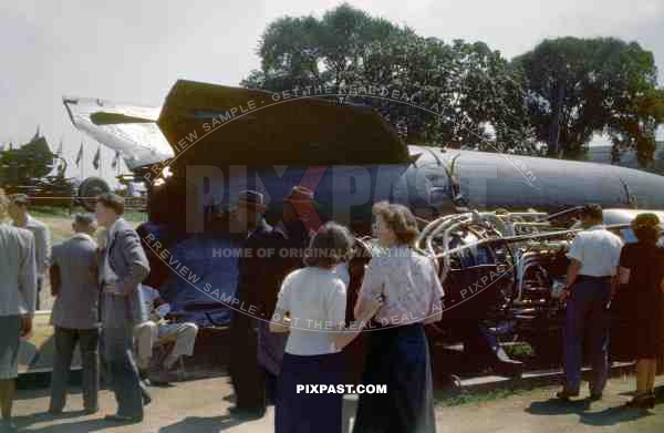 American civilians inspecting a German V2 long-range guided ballistic missile in Washington DC. USA 1946.