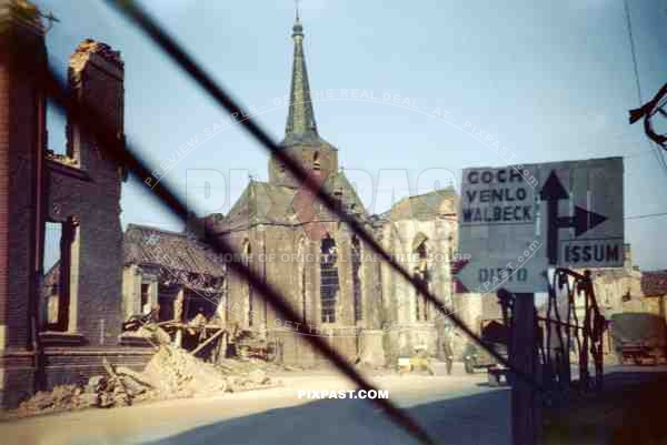 American MP Military Police doing traffic duty beside  the Church of St. Maria Magdalena Geldern September 1944