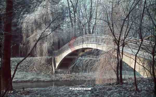 arch bridge over the river WeiÃŸe Elster in Pegau, Germany ~1940