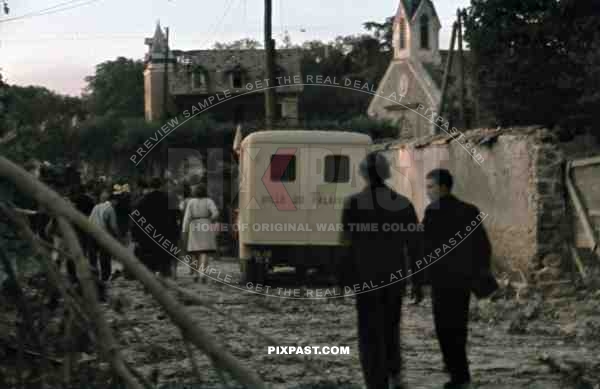 Bomb damage outside of Paris 1943, American aircraft day attack. French police and Luftwaffe soldiers.