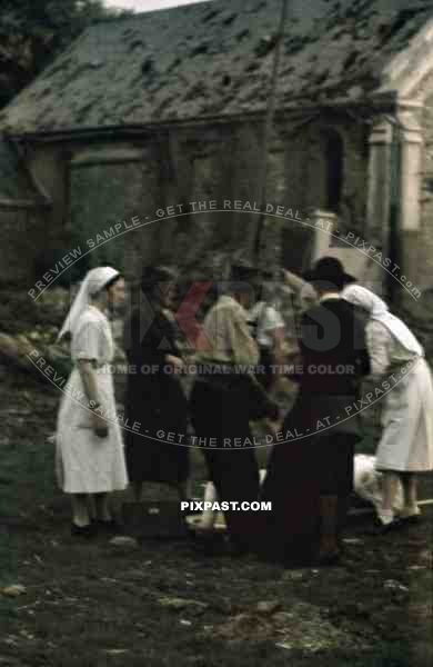 Bomb damage outside of Paris 1943, American aircraft day attack. French police and Luftwaffe soldiers. Palaiseau