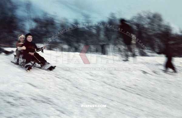 Children playing on a snow sled. Berlin. Winter 1940