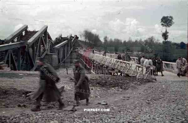 construction of a wooden bridge next to a broken rail bridge near Belgrade, Serbia ~1941