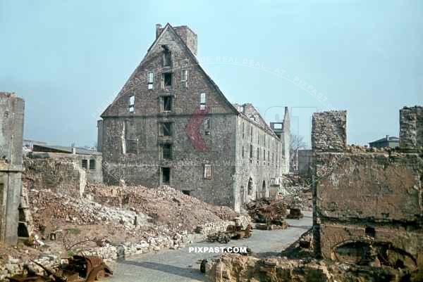 Destroyed / Bombed and burned convoy of German army trucks and cars in Kassel Germany June 1944