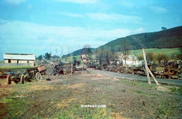 Destroyed Russian tank and artillery column on outskirts of Smolensk July 1941. Russian Heavy Tank KV2 Gigant 152mm