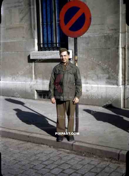 Dijon France VE Day (Victory in Europe) May 8th 1945 american soldier uniform hat no parking sign.