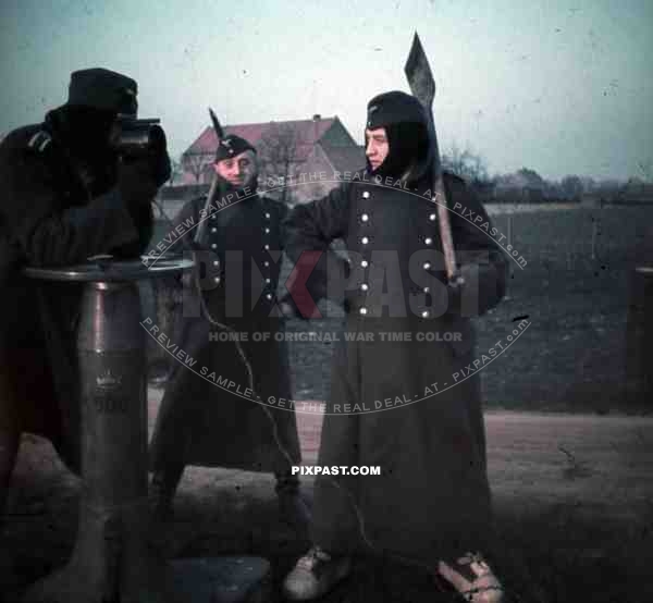 Dunkirk France winter 1940 Luftwaffe flak soldiers shovel aircraft viewer winter boots jacket