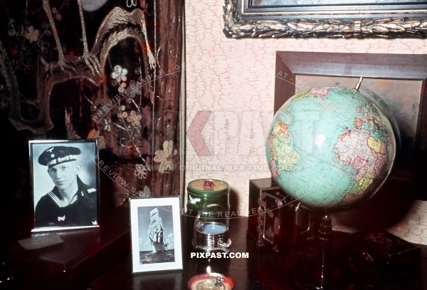 Family sitting room Germany 1939. With World Globe and framed portrait of Sailor son. Segelschulschiff Horst Wessel