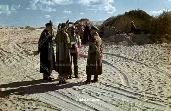 Field Marshal Erwin Rommel talks with Army Generals, Tunisian Desert 1942.