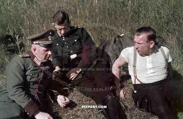 field police uniform black uniform resting in hay field 1939