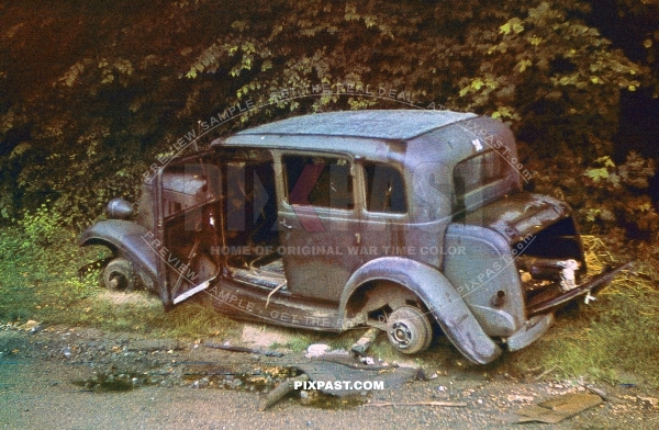 French Army Staff Car No. 24 crashed in the french ditch near Dunkirk France 1940. Wheels have been removed