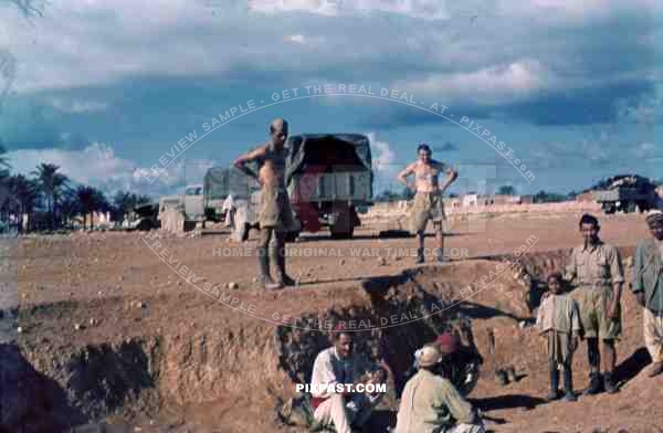 German Afrika Korp soldiers with local people, North Africa 1942