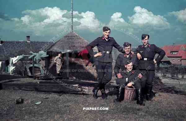 German anti aircraft Flak soldiers joking in Belgium garden near Bruges Belgium 1940