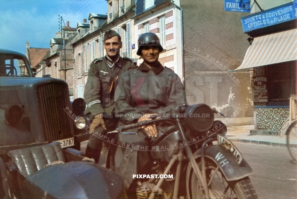 German army messenger Kradmelder on his BMW motorbike in Dunkirk France 1940 57th Infanterie Div Grenadier Regiment 199