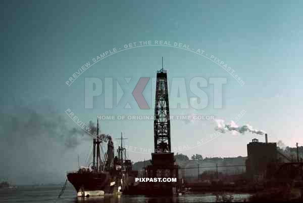 German Cargo Ship in Bordeaux Harbour France 1940. Large Crane and Industry.