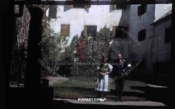 German Flak Luftwaffe officer surrender with girlfriend to American GIs in Schloss Heiligenberg near Darmstadt 1945.