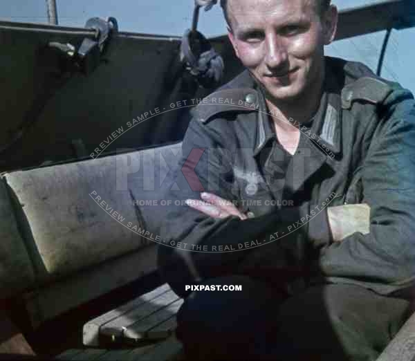 German half track radio operator with red artillery piping inside armoured car Russian front 1944. sdkfz-250