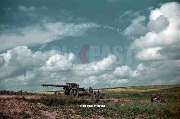 German heavy 15cm Artillery cannon under camouflage, Russia 1942. 19th Panzer Division.