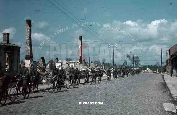 german infantry on bikes bombed french village 1940