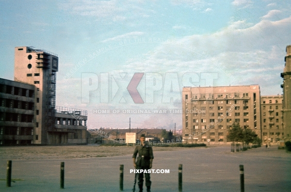 German infantry soldier posing in the market place of Kharkov Ukraine 1942. 177. Division Kraftfahr Ersatz Battalion