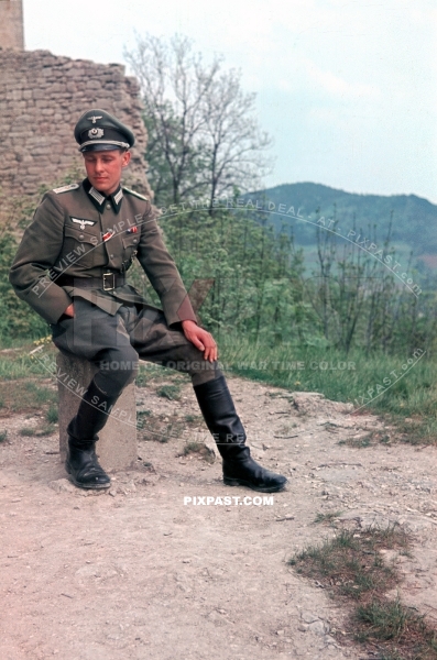 German Infantry Wehrmacht officer standing beside old castle in Lindau Germany 1944