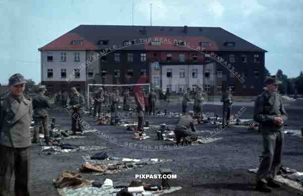 German kid Stug panzer soldiers in POW camp, Germany. 1945.