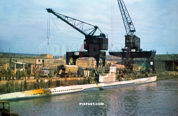 German Kriegsmarine Uboat Submarine reloading supplies on the dock of Saint Nazaire sub base France 1942