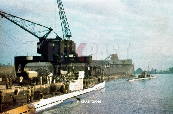 German Kriegsmarine Uboat Submarine reloading supplies on the dock of Saint Nazaire sub base France 1942