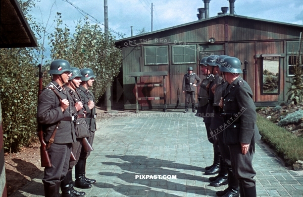 German Luftwaffe air force soldiers parade with Kar98 rifles at security station for RAD bridge repair unit. France 1940