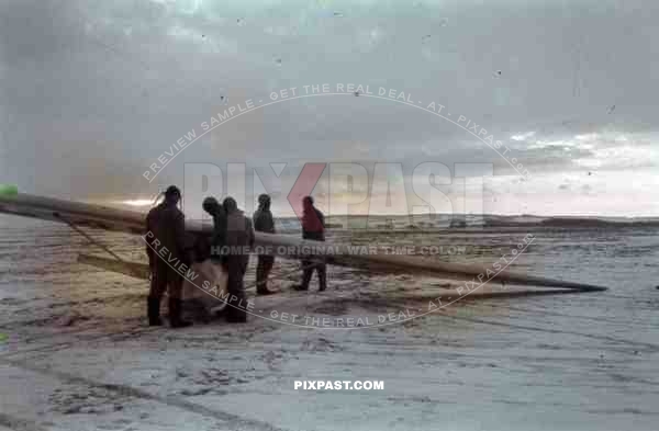 German Luftwaffe airforce Glider pilot sitting in glider plane Lubeck Winter snow 1943