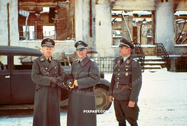 German Luftwaffe officers. Behind war reporter Kriegsberichter in Smolensk west Russia winter 1942. Uspensky  Cathedral