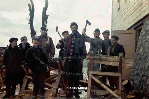 German police men and children humiliating Jewish Slave Laborer, Poland 1941.