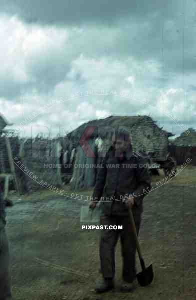 German soldier with beard and shovel, Russian village, Don, Tschir, 1942, 22. Panzer Division