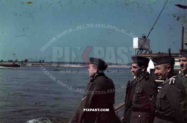 German soldiers on ferry boat on the river Seine, near Paris, France, 1940. rowing boat, canal boat,