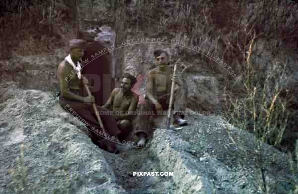 German soldiers smoking pipe and digging bunker, Russian Front 1943, 22nd Panzer Division,