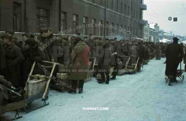 German soldiers wait at train station with bags and luggage on Russian sleds, Don, Tschir, 1943, 22. Panzer Division,