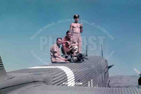 German War Photographer Otto Vieth on top of Junkers Ju 52 Transport Plane in El-Aouiana Airport, Tunisia