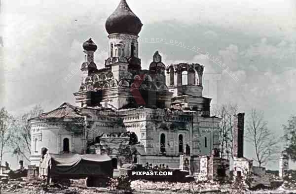 half-track vehicle in front of the Trinity church in Ula, Russia, Belarus ~1942