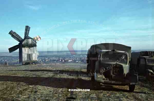 Krasnopillya, Sumy, Ukraine, Winter 1941, Supply trucks beside Windmill,  94. Infantry Division. Mercedes Diesel L3000