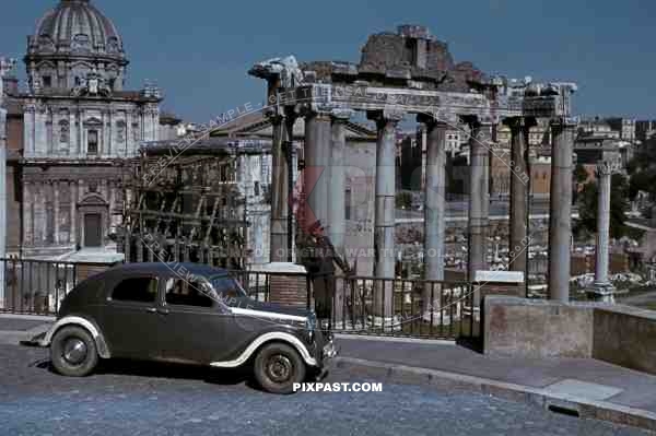 Luftwaffe flak officer with Krim Shield of the Leichte Flak Abteilung 99 (mot) in Rome Italy 1944 with staff car.