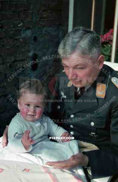 Luftwaffe officer with his child in Halle Saale, Germany 1941