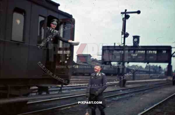 Luftwaffe officers empty train toilet at the railway yard in Stendal, Germany 1940 