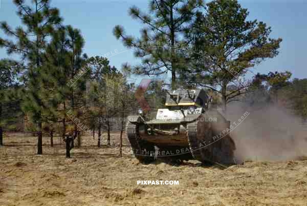 M1 M1A1 combat car US light tank with yellow training marker. Twin turrets with single .50 machine guns. Mae West. 1940