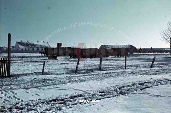 Military train wagon locomotive parked yard snow Poland 1940 winter