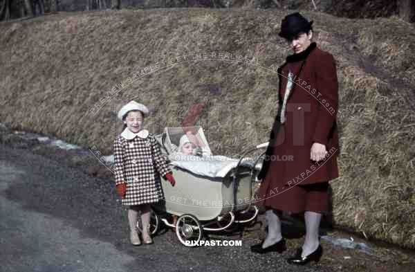 mother going for a walk with her children, Germany 1938