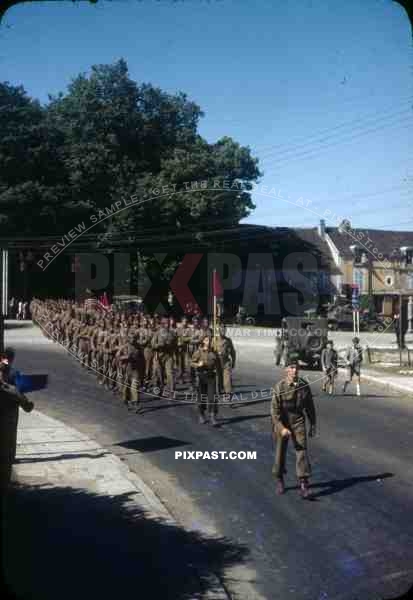 negro soldiers on Bastille day parade in Langres, France 14th July 1945