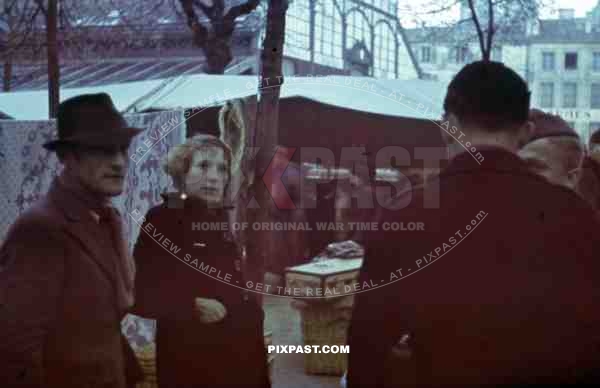 Niort France 1941, Place des Halles, Markthalle, Market Hall with panzer man shopping, 22nd Panzer Division.