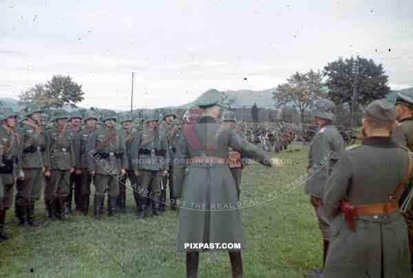 Officers in WW1 helmets inspecting infantry soldiers, Wendlingen, Germany, 1939. 14th Infantry Division.